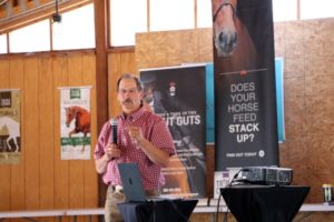Man presenting about the horses gut
